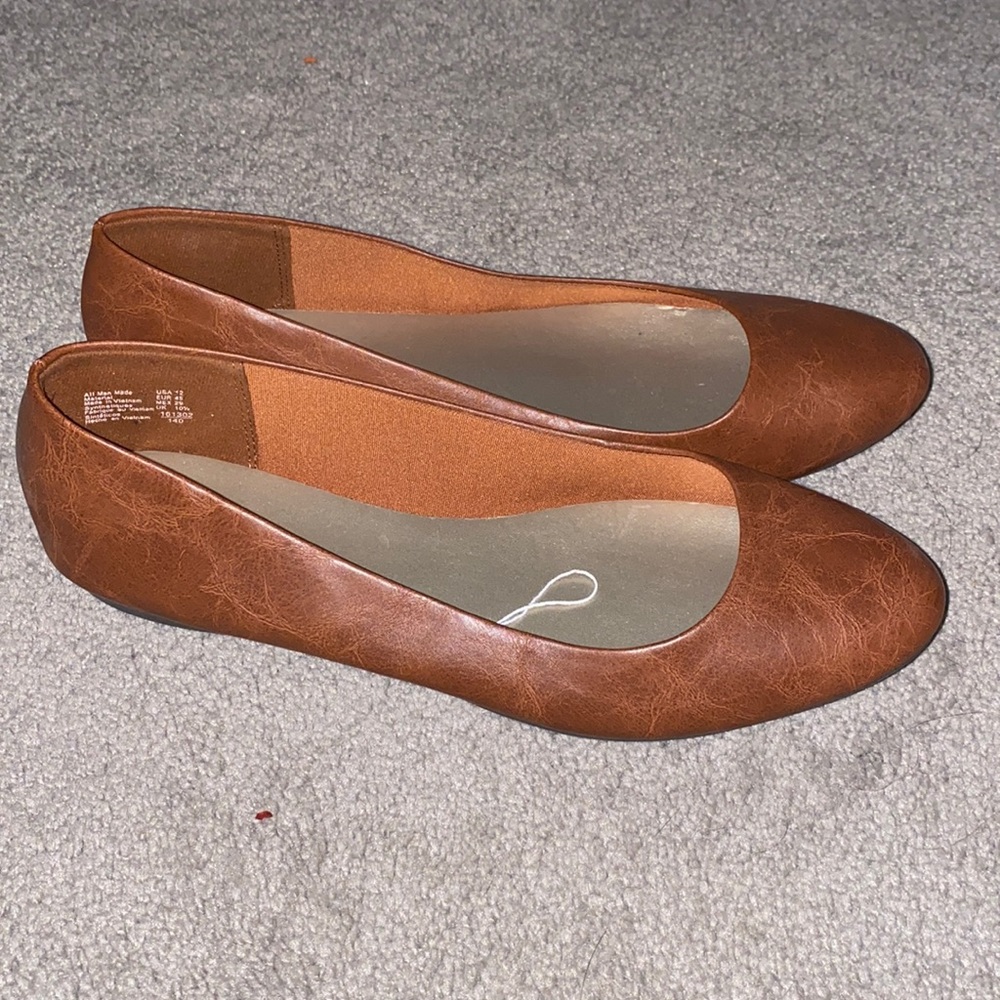 Brown leather flats